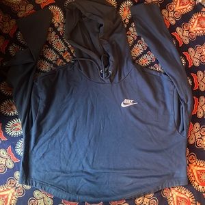 cropped dark blue/ish navy w a light pink nike logo, hoodie.